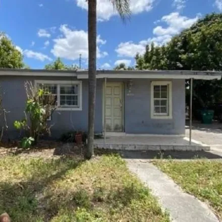Buy this 3 bed house on 3200 Northwest 87th Street in Miami-Dade County, FL 33147