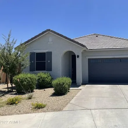 Rent this 3 bed house on West Mackamore Drive in Surprise, AZ 85001