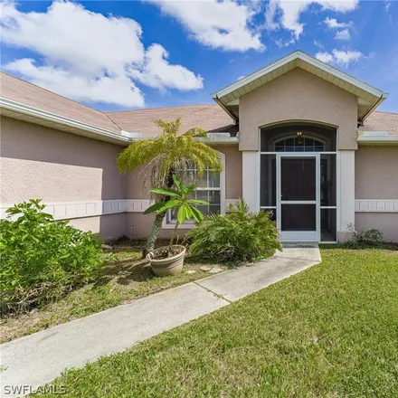 Buy this 4 bed house on 1509 Northeast 10th Lane in Cape Coral, FL 33909