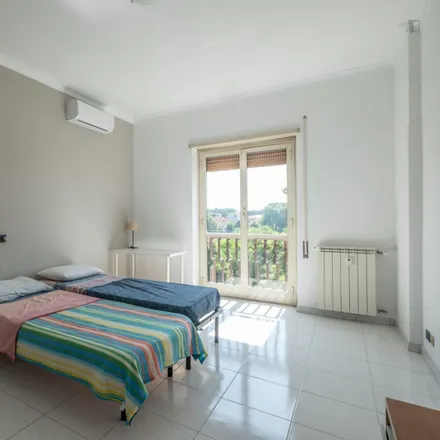 Rent this 3 bed room on Via Beniamino Costantini in 00177 Rome RM, Italy