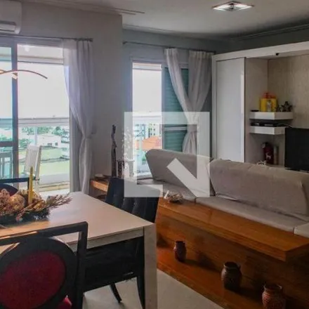 Rent this 3 bed apartment on Avenida Almirante Tamandaré in Enseada, Guarujá - SP