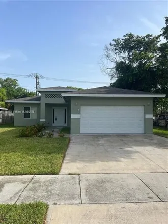 Rent this 3 bed house on 2655 Northwest 9th Court in Collier Park, Pompano Beach