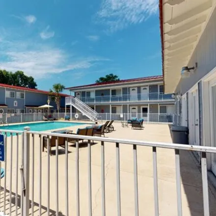 Rent this 2 bed condo on 1664 Beach Blvd Apt J151 in Biloxi, Mississippi