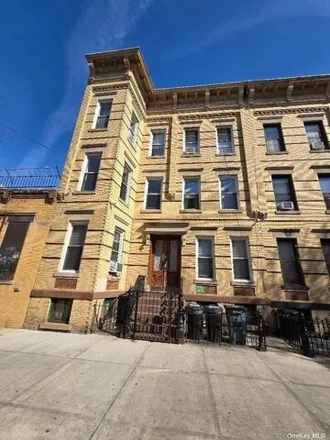 Buy this 14 bed house on 5624 Putnam Avenue in New York, NY 11385