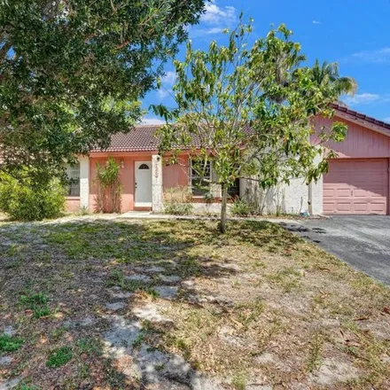 Buy this 3 bed house on 1161 Northwest 91st Avenue in Coral Springs, FL 33071