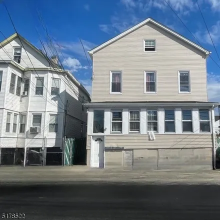 Buy this 8 bed townhouse on Wendy's in 145 Broadway, Paterson