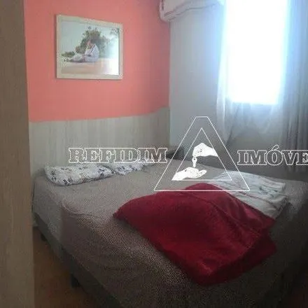 Buy this 2 bed apartment on Rua Ovidio Colus in José Sampaio, Ribeirão Preto - SP