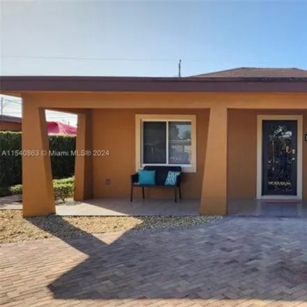 Rent this 3 bed house on 720 Northeast 4th Place in Sun-Tan Village, Hialeah