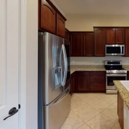Rent this 4 bed apartment on 3315 East Grand Canyon Drive in Quail Springs, Chandler