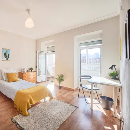 Rent this 6 bed room on Pastelaria Bélgica in Rua Filipe da Mata 1, 1600-021 Lisbon