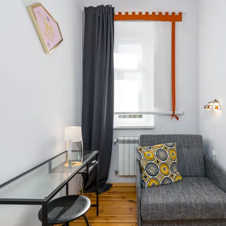 Rent this 4 bed room on Henryka Siemiradzkiego 10a in 60-763 Poznan, Poland