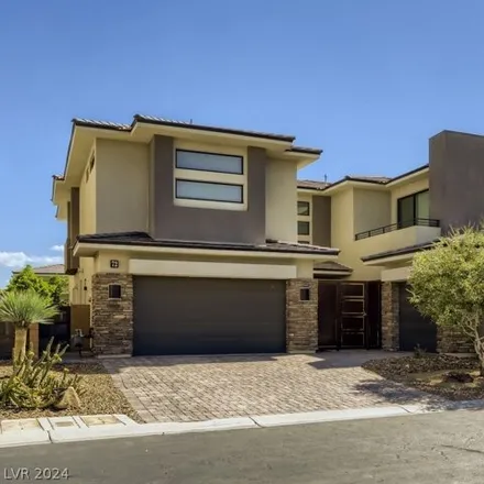 Rent this 4 bed house on 76 Grey Feather Drive in Summerlin South, NV 89135