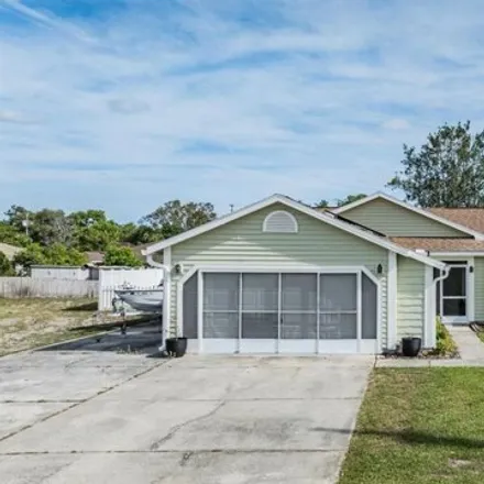 Buy this 3 bed house on 11240 Holbrook Street in Spring Hill, FL 34609