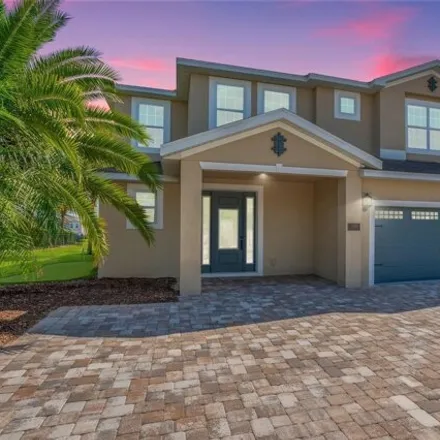 Buy this 9 bed house on 7608 Fairfax Drive in Four Corners, FL 34747