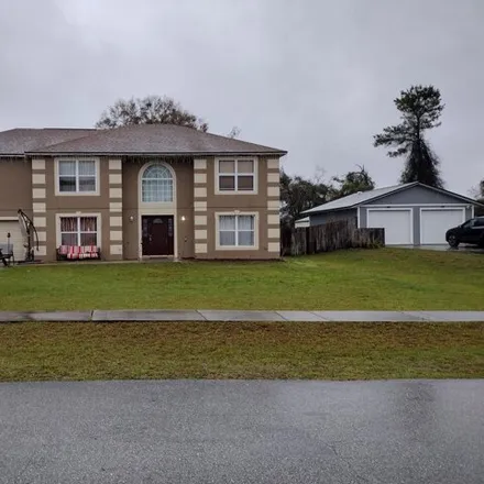 Buy this 5 bed house on 2941 Higate Dr in Deltona, Florida