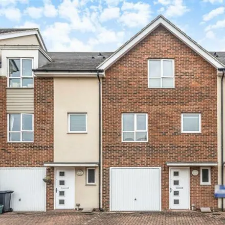 Buy this 4 bed townhouse on Canford Drive in Chertsey, KT15 2EY