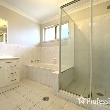 Rent this 3 bed townhouse on Lang Road in Casula NSW 2170, Australia