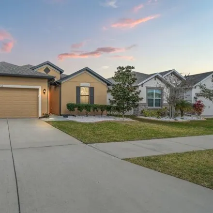 Buy this 4 bed house on Old Windsor Way in Spring Hill, FL 34909