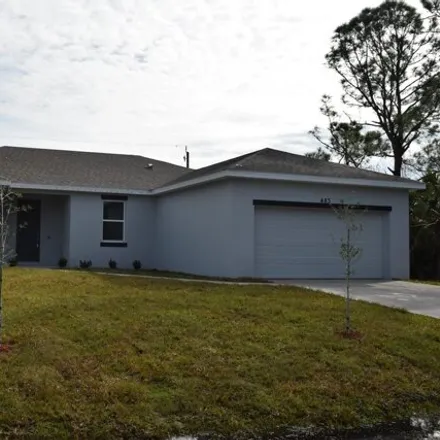 Rent this 4 bed house on 483 Grenadier Avenue Northwest in Palm Bay, FL 32907