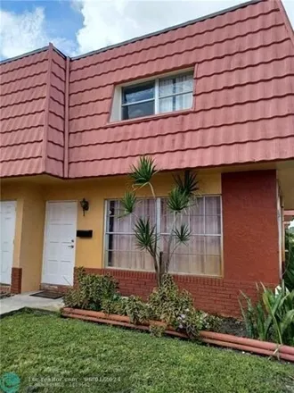 Rent this 2 bed townhouse on 2544 Northwest 52nd Avenue in Lauderhill, FL 33313