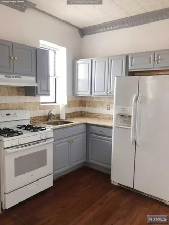 Rent this 2 bed condo on Rumba's Cafe in North Street, Jersey City