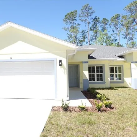 Rent this 3 bed house on 165 Brunswick Lane in Palm Coast, FL 32137