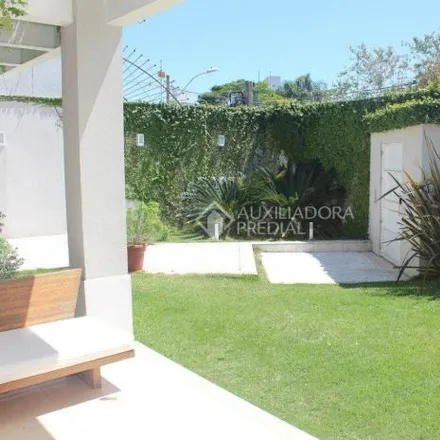Buy this 4 bed house on Rua Engenheiro Ildefonso Simões Lopes in Três Figueiras, Porto Alegre - RS