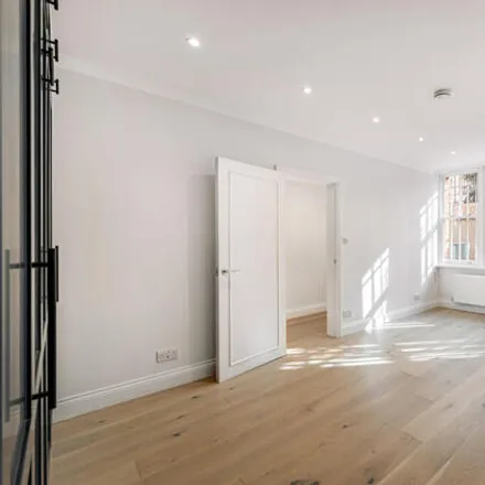 Rent this studio townhouse on 54-56 Cadogan Square in London, SW1X 0JS