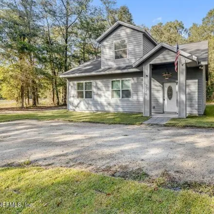 Buy this 4 bed house on 2784 Poinsettia Avenue in Middleburg, Clay County
