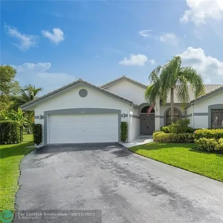 Buy this 5 bed house on 12051 Northwest 2nd Drive in Coral Springs, FL 33071