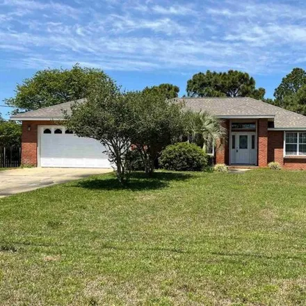 Rent this 3 bed house on 7548 Manatee Street in Navarre, FL 32566