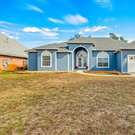 Buy this 3 bed house on 1972 Costa Verde Court in Navarre, FL 32566