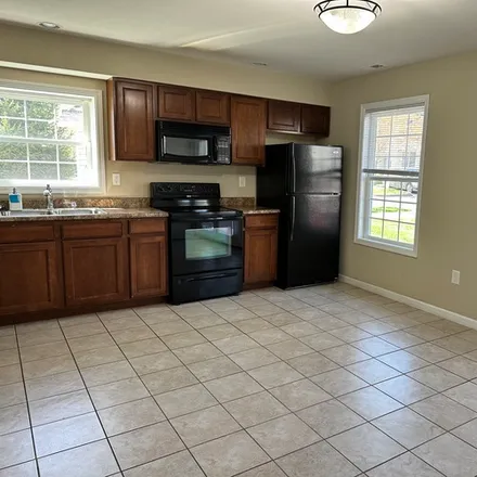 Rent this 3 bed townhouse on 2867 East Creeks Edge Drive
