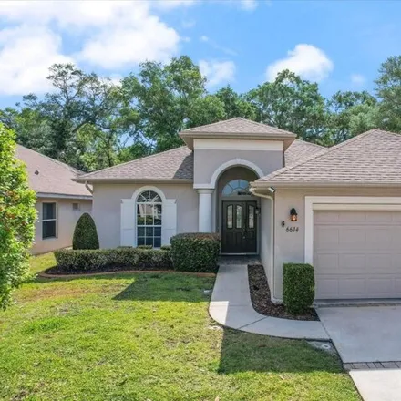 Buy this 4 bed house on 6614 Green Acres Blvd in New Port Richey, Florida