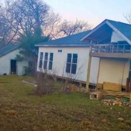 Buy this 3 bed house on 8506 State Highway 34 N in Wolfe City, Texas