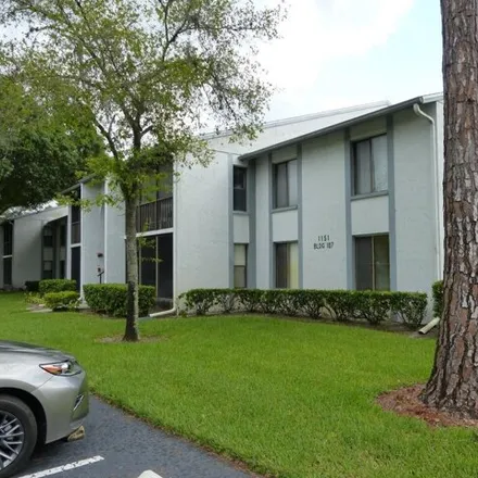 Rent this 2 bed condo on 1189 Pine Ridge Circle West in East Lake, FL 34688