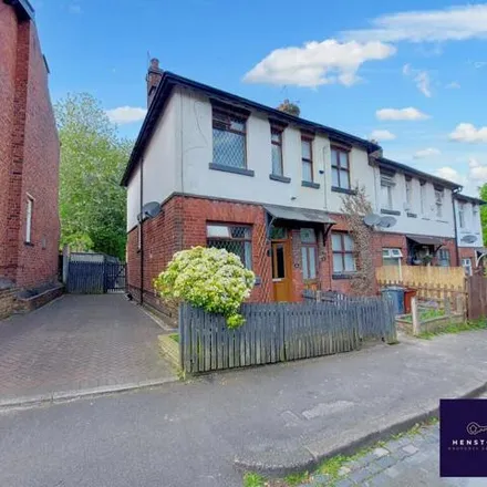 Buy this 2 bed townhouse on Crab Lane in Manchester, M9 8WB
