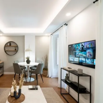 Rent this 4 bed apartment on Madrid in Bar La Taberna, Calle de Bailén