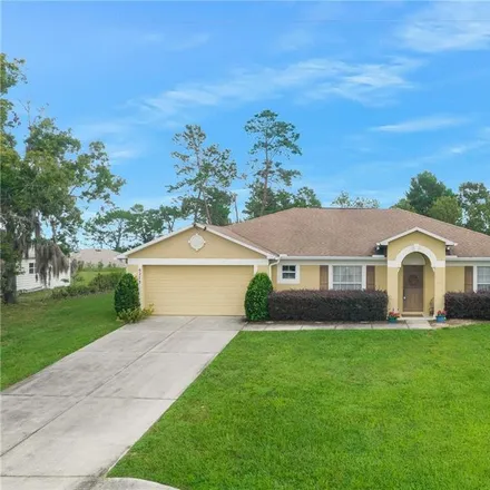 Buy this 4 bed house on 6273 Grapewood Road in Spring Hill, FL 34609