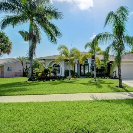 Rent this 3 bed house on 13785 Folkstone Circle in Wellington, Palm Beach County