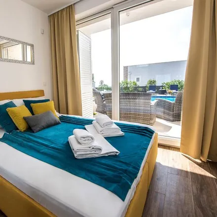 Rent this 4 bed house on 53291 Grad Novalja