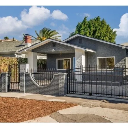 Rent this 2 bed house on 838 N Ridgewood Pl Unit 1/2 in Los Angeles, California