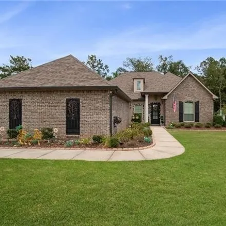 Buy this 5 bed house on 355 Saw Grass Loop in St. Tammany Parish, LA 70435