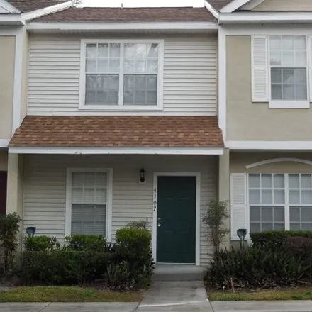 Rent this 2 bed townhouse on 4011 Plantation Cove Drive in Lockhart, Orange County