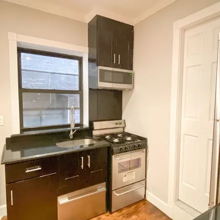 Rent this 3 bed apartment on Church of the Sacred Heart of Jesus in 457 West 51st Street, New York