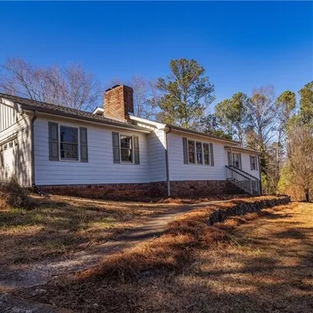 Buy this 4 bed house on 11494 Highway 92 in Woodstock, GA 30188