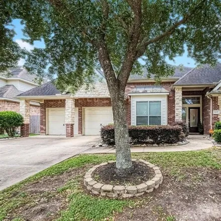 Buy this 4 bed house on 8621 Sunrise Meadow Lane in Copper Lakes, TX 77095