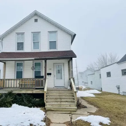 Buy this 2 bed house on 1717 14th Avenue in Menominee, MI 49858