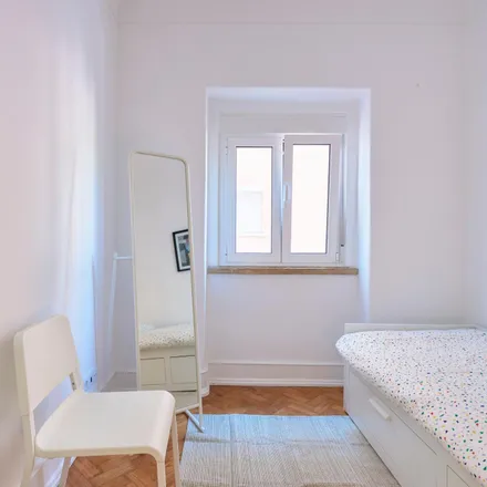 Rent this 5 bed room on Rua da Beneficência 40 in 1600-021 Lisbon, Portugal