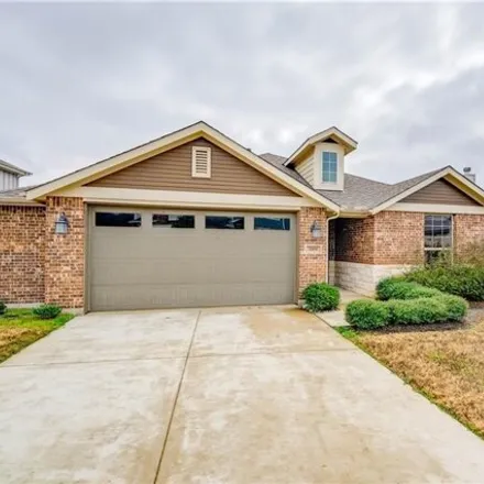 Rent this 4 bed house on 7001 Sienna Rouge Path in Travis County, TX 78744